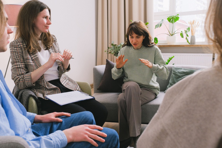 Participants discussing life transitions during a counselling group session