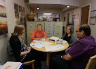 Alternative Therapy team collaborating around a table