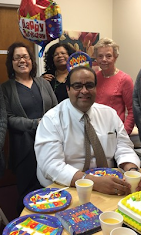 Alternative Therapy team celebrating together indoors